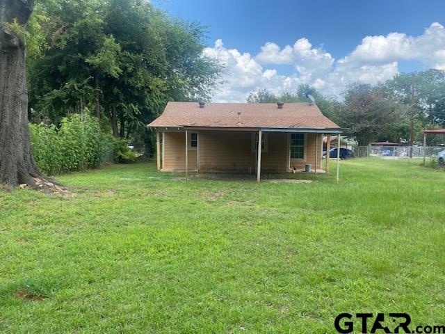 11787 Wood Springs Road Tyler, TX 75706 - Photo 12 of 13 a front view of a house with garden