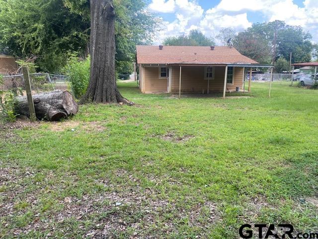 11787 Wood Springs Road Tyler, TX 75706 - Photo 13 of 13 a view of a house with a backyard