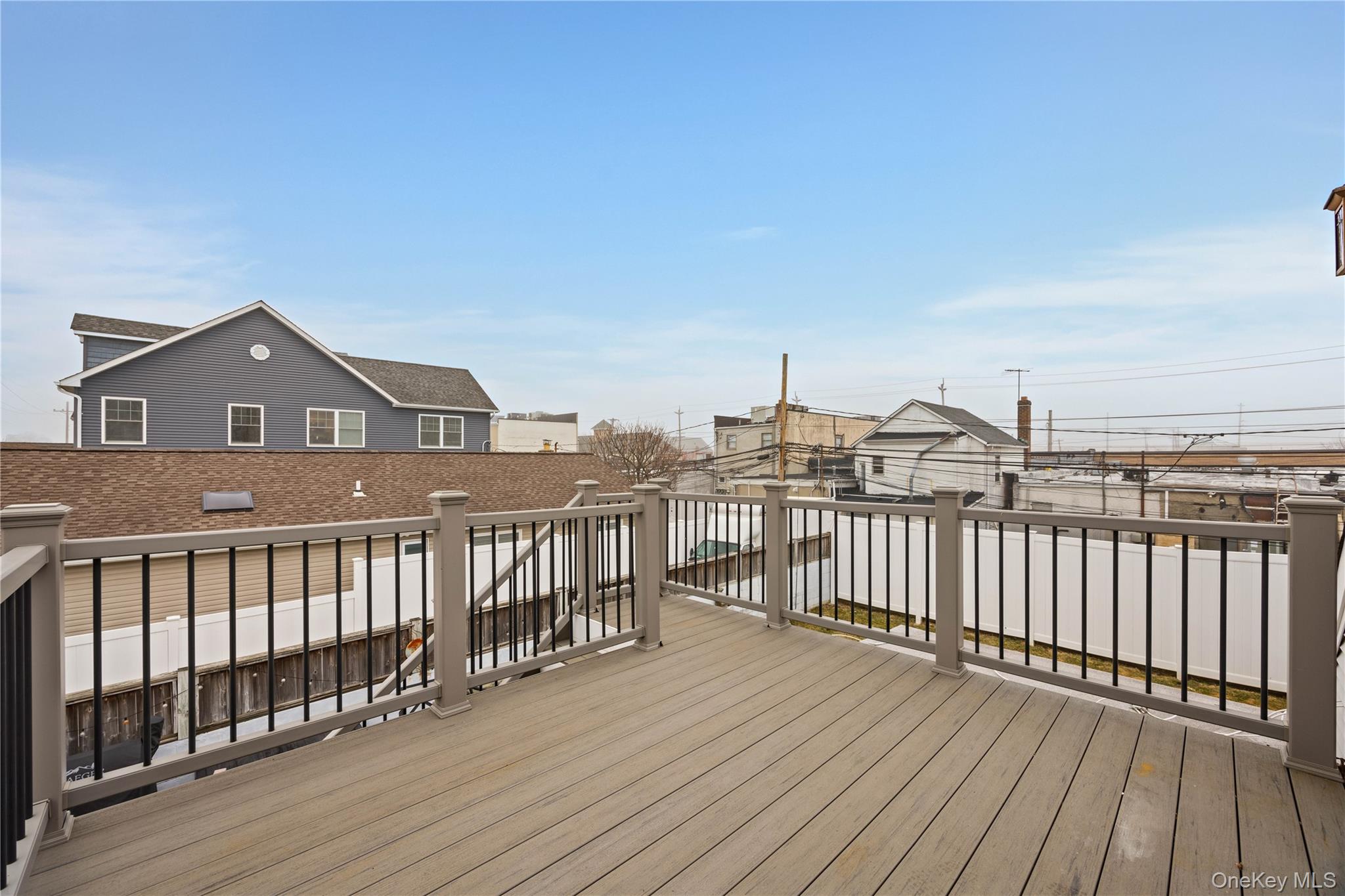 96 Warwick Road Island Park, NY 11558 - Photo 3 of 13 a view of a city from a roof deck