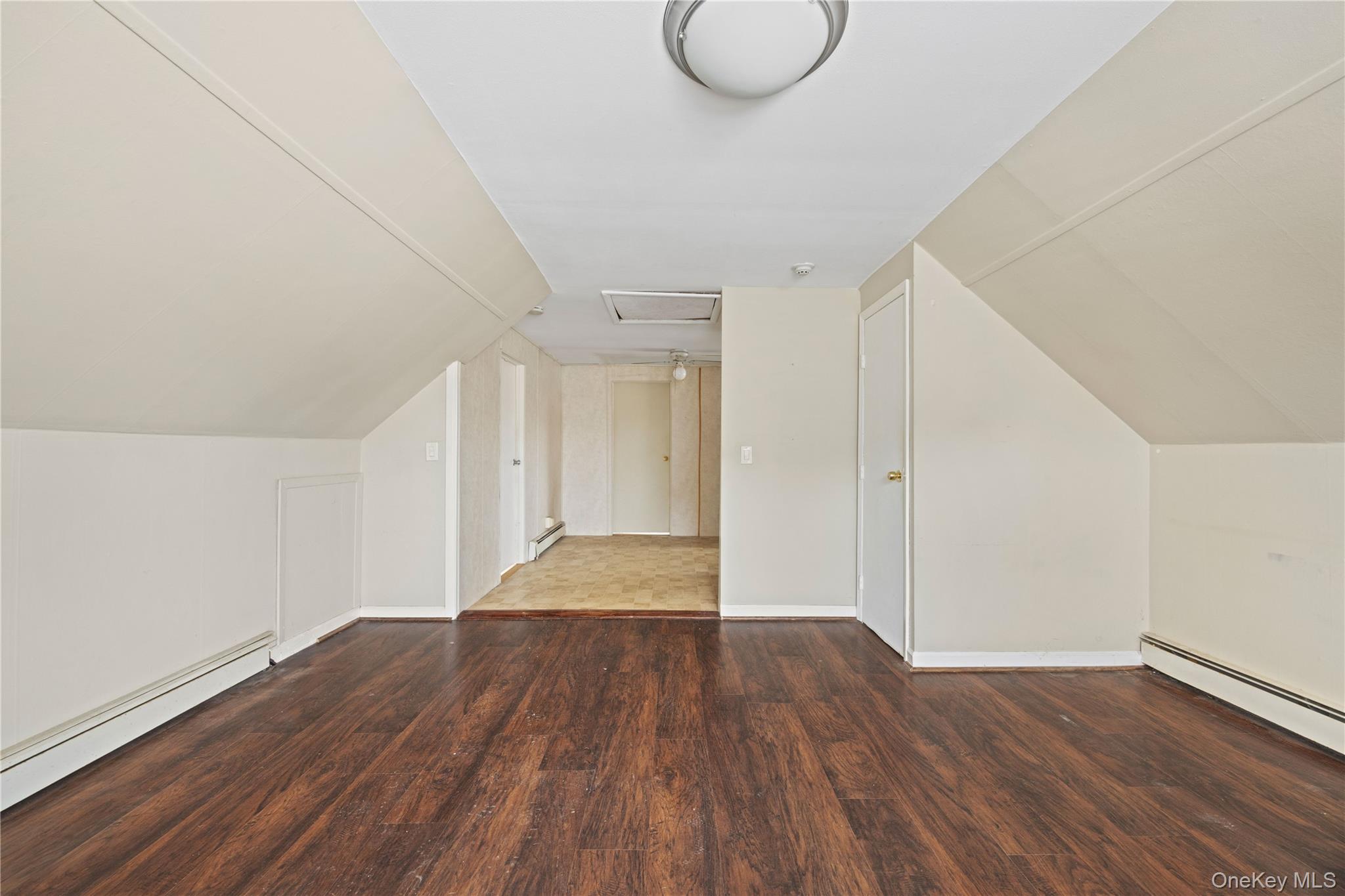 96 Warwick Road Island Park, NY 11558 - Photo 4 of 13 a view of a livingroom with wooden floor