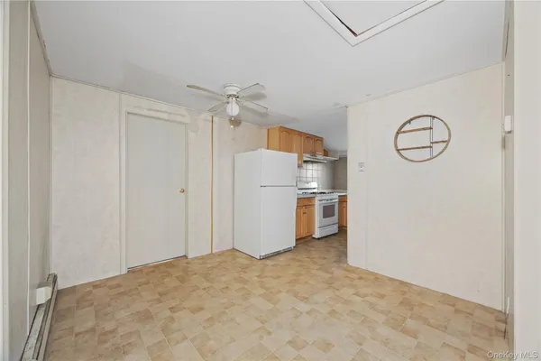 a view of a storage & utility room with a sink