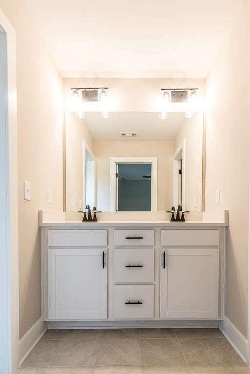 2545 Waldrop Ridge Court Decatur, GA 30034 - Photo 18 of 31 a bathroom with a sink and a mirror