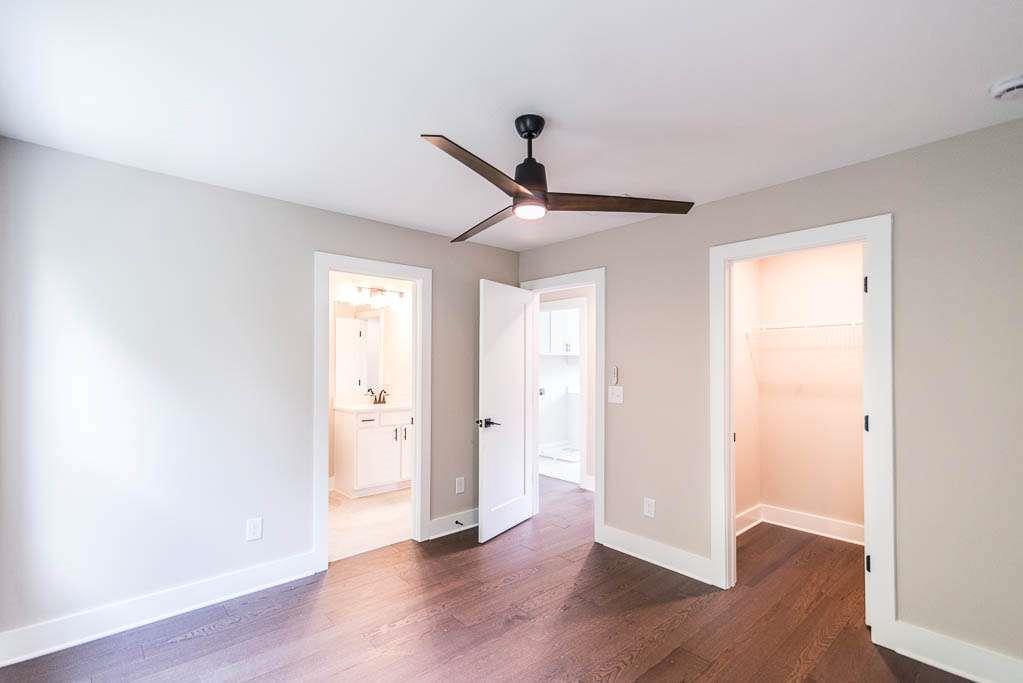 2545 Waldrop Ridge Court Decatur, GA 30034 - Photo 19 of 31 a view of a big room with wooden floor and windows