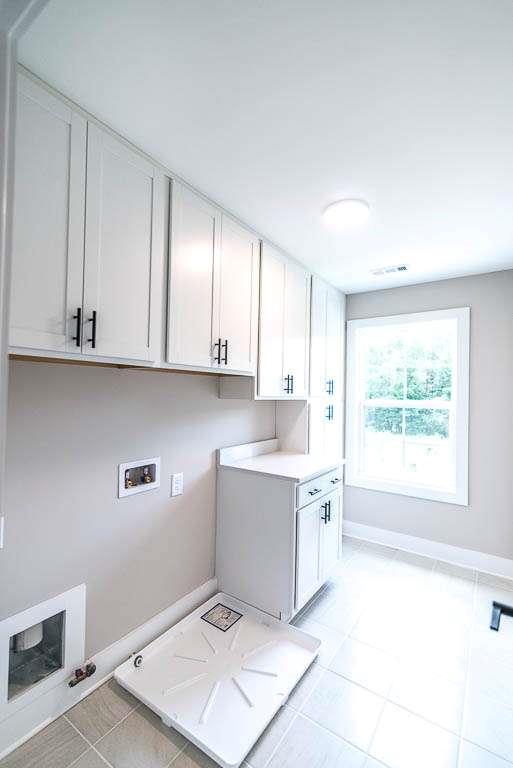 2545 Waldrop Ridge Court Decatur, GA 30034 - Photo 24 of 31 a kitchen with a sink cabinets and window