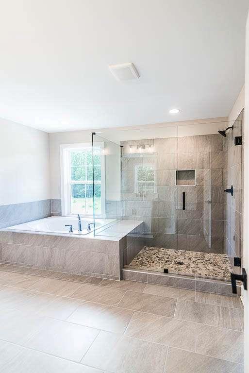 2545 Waldrop Ridge Court Decatur, GA 30034 - Photo 29 of 31 a spacious bathroom with a bathtub and shower