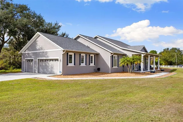 a view of a house with a swimming pool