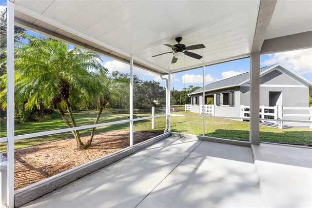 a view of a golf course with swimming pool