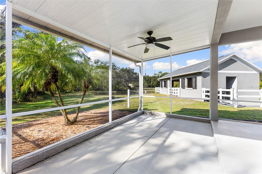 12305 Twin Branch Acres Road Tampa, FL 33626 - Photo 28 of 66 a view of a house with a swimming pool