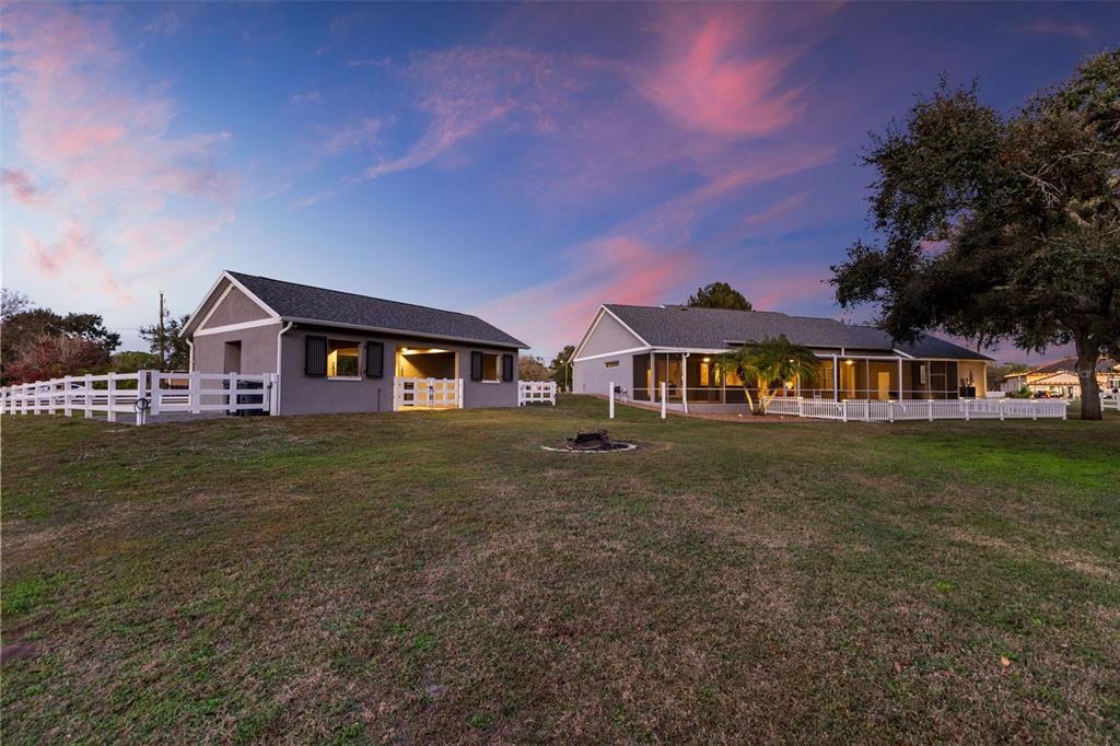 12305 Twin Branch Acres Road Tampa, FL 33626 - Photo 33 of 66 a front view of a house with garden