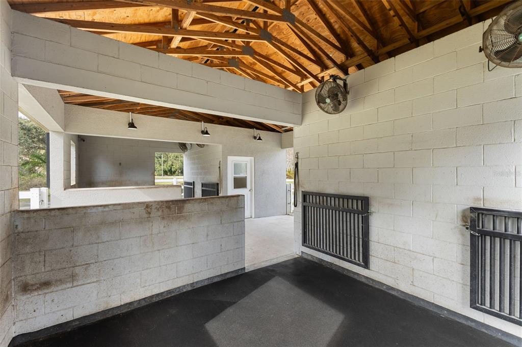 12305 Twin Branch Acres Road Tampa, FL 33626 - Photo 45 of 66 a view of a hallway with entryway and chandelier