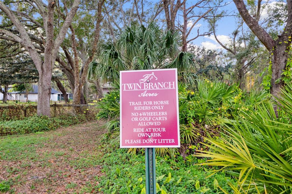 12305 Twin Branch Acres Road Tampa, FL 33626 - Photo 56 of 66 a sign on the side of a road