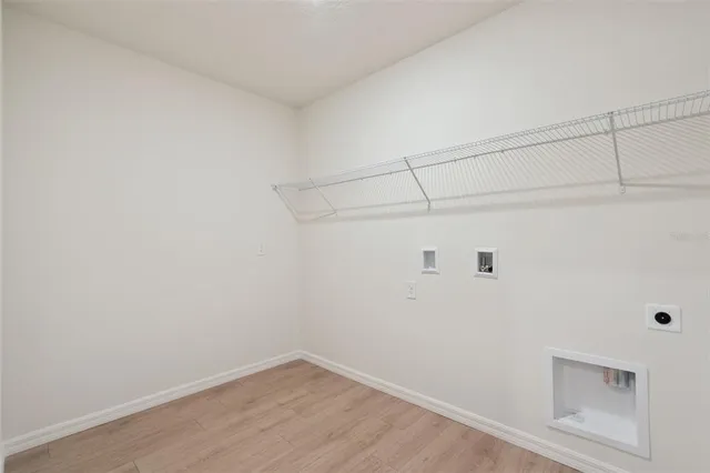 a view of a room with racks on the wall