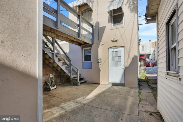 a car parked in front of a house