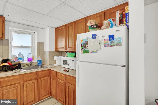 a bedroom with a bed and lamps