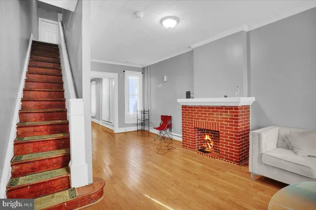 a view of livingroom with furniture and stairs