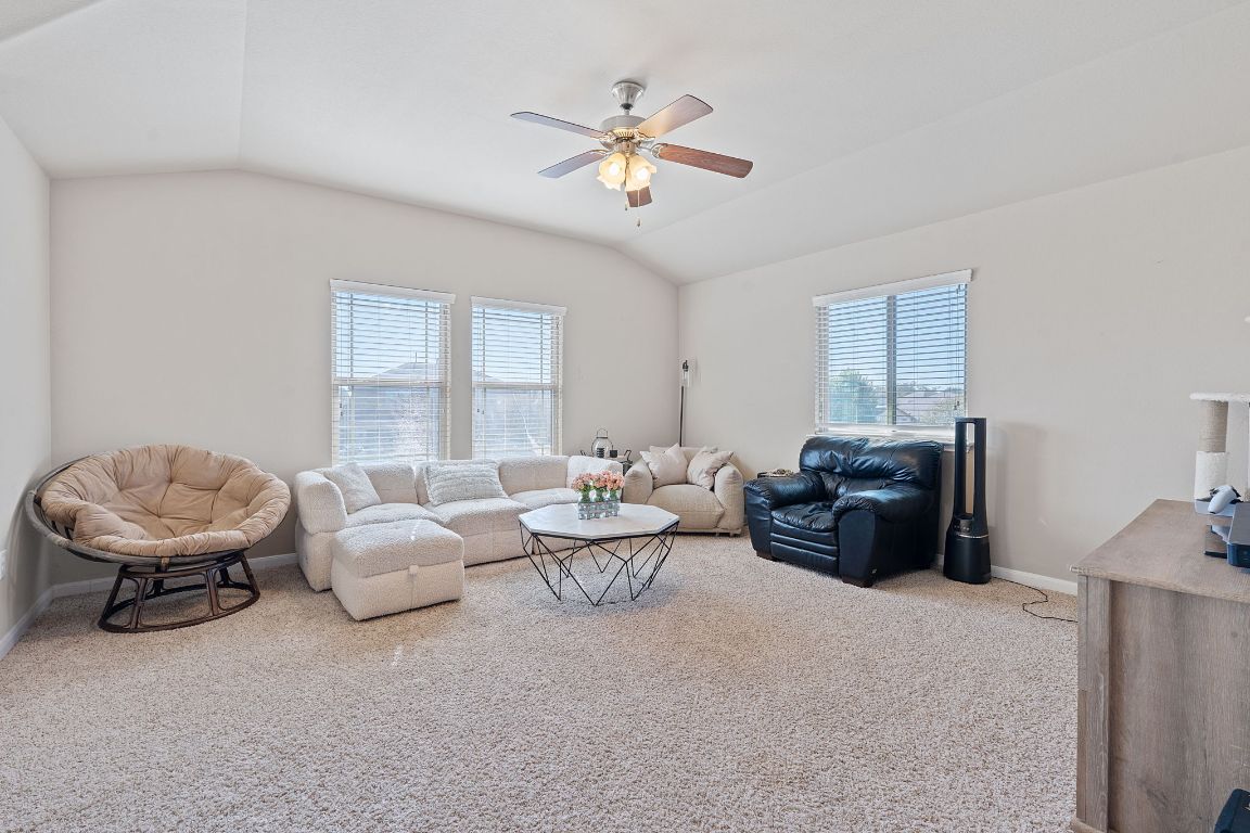 608 Palo Duro Loop Round Rock, TX 78664 - Photo 13 of 28 a living room with furniture and a large window