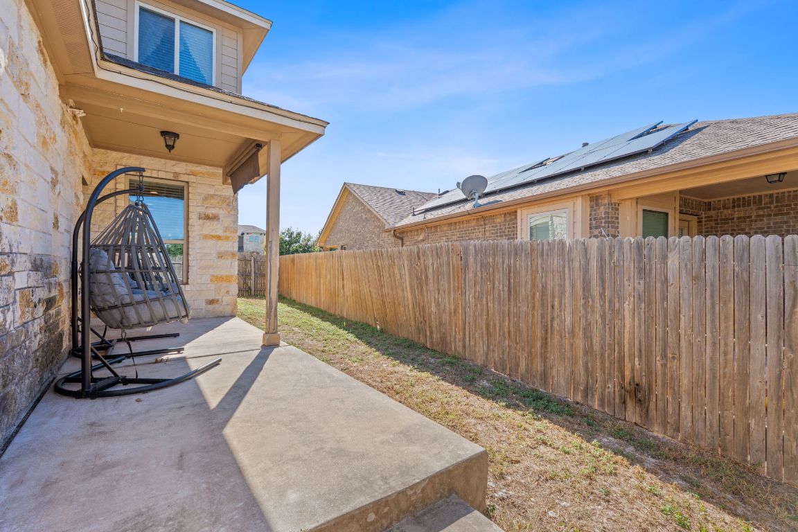 608 Palo Duro Loop Round Rock, TX 78664 - Photo 24 of 28 a view of a wooden house with a wooden fence