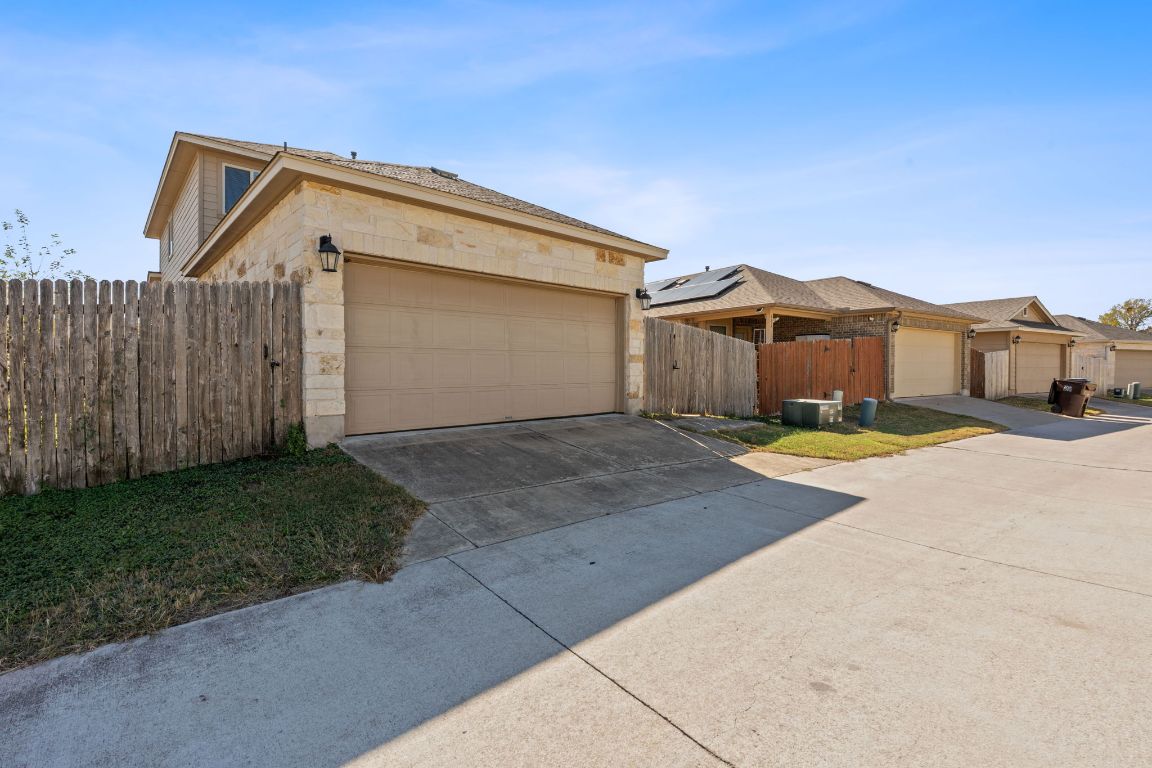 608 Palo Duro Loop Round Rock, TX 78664 - Photo 28 of 28 a view of a house with a yard
