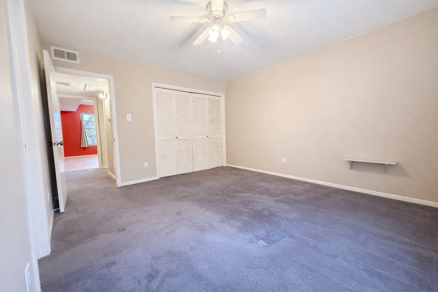8223 Kingsbrook Road, Unit 215 Houston, TX 77024 - Photo 12 of 20 Another angle of the primary bedroom highlighting the extra closet space.