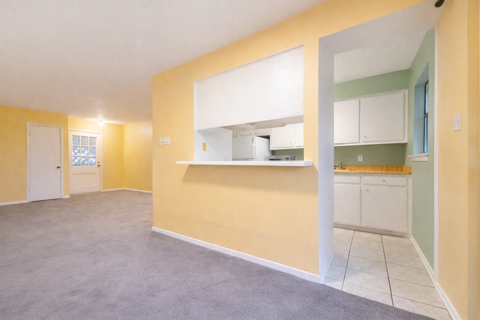 8223 Kingsbrook Road, Unit 215 Houston, TX 77024 - Photo 8 of 20 View of the kitchen from the dining space.