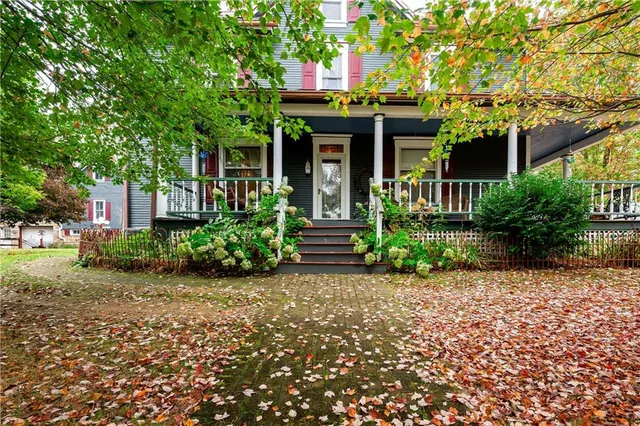 front view of a house with a small yard