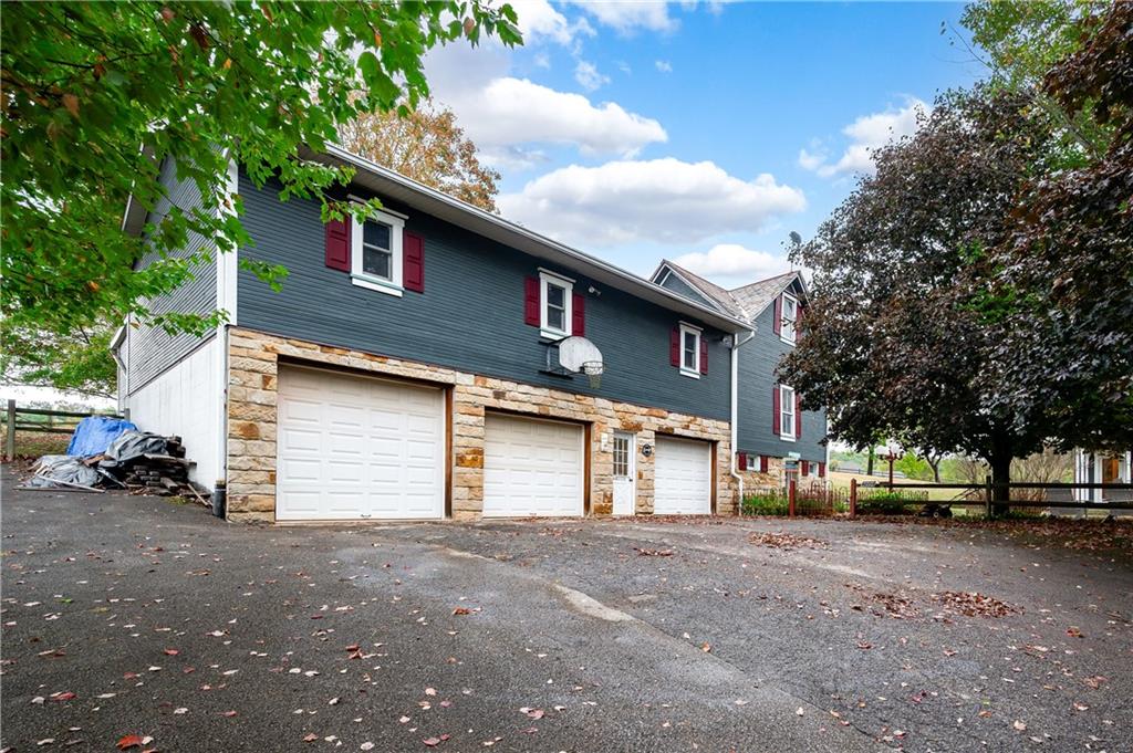 227 Aggas Road West Sunbury, PA 16061 - Photo 45 of 50 3 Stall Detached Garage with workshop