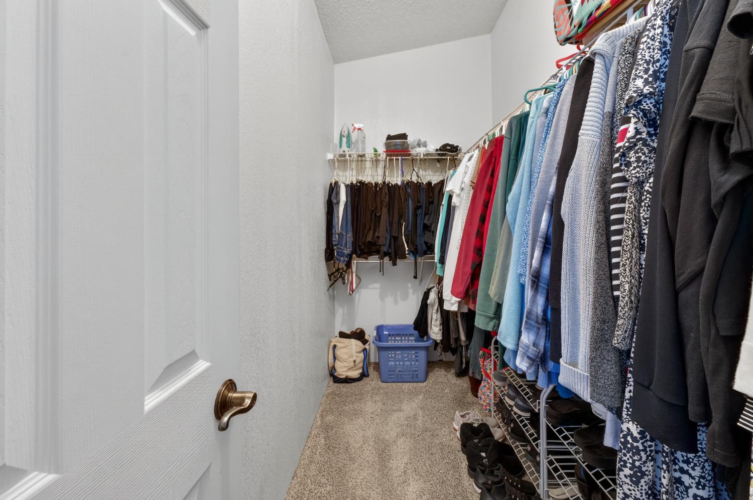 2450 George Road Williams, CA 95987 - Photo 17 of 43 a view of walk in closet with clothes