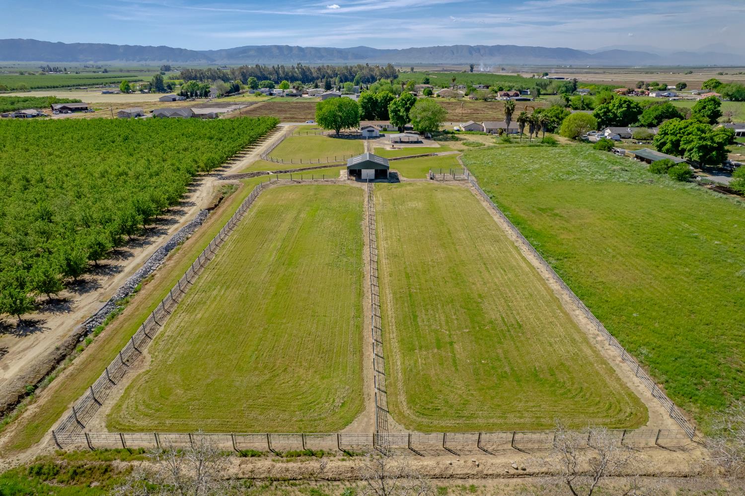 2450 George Road Williams, CA 95987 - Photo 4 of 43 a view of a swimming pool with a yard and mountain view