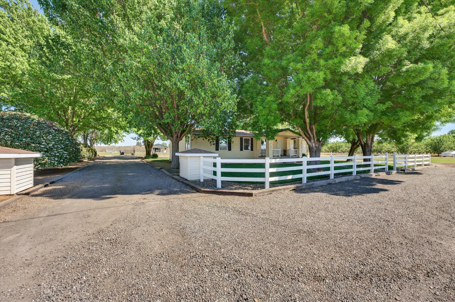 2450 George Road Williams, CA 95987 - Photo 43 of 43 a backyard of a house with wooden floor and fence