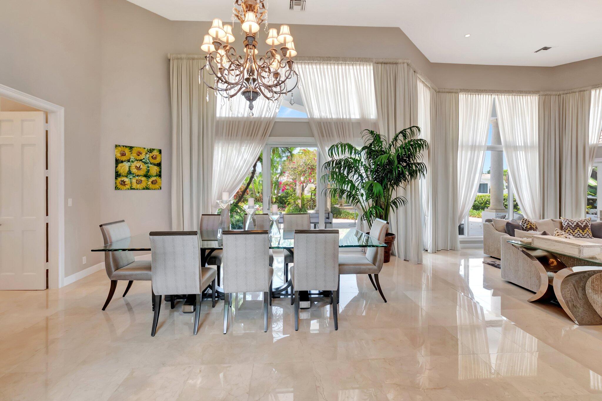 2599 Northwest 63rd Lane Boca Raton, FL 33496 - Photo 13 of 81 a view of a dining room with furniture window and outside view