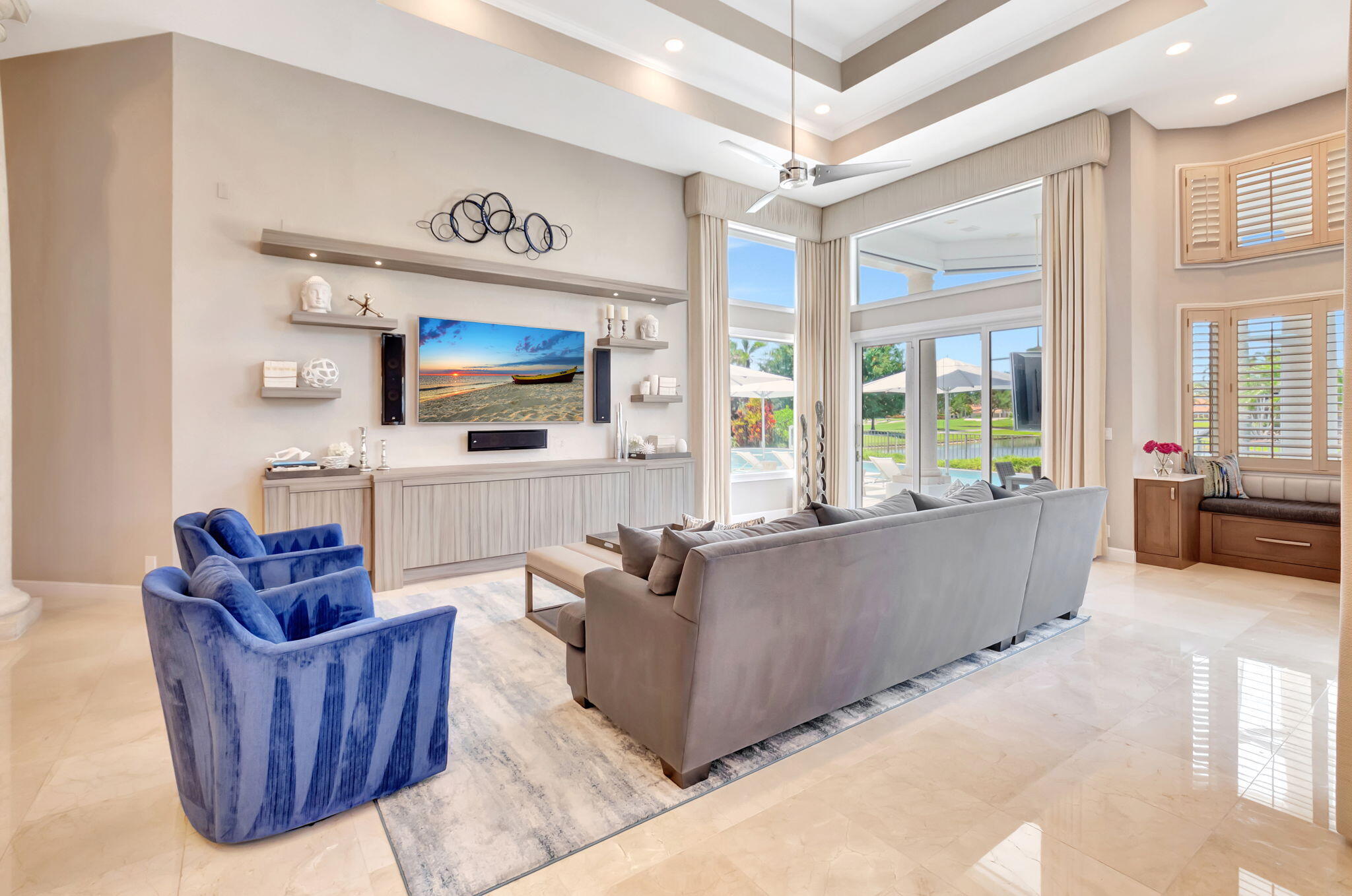 2599 Northwest 63rd Lane Boca Raton, FL 33496 - Photo 21 of 81 a living room with furniture and a flat screen tv