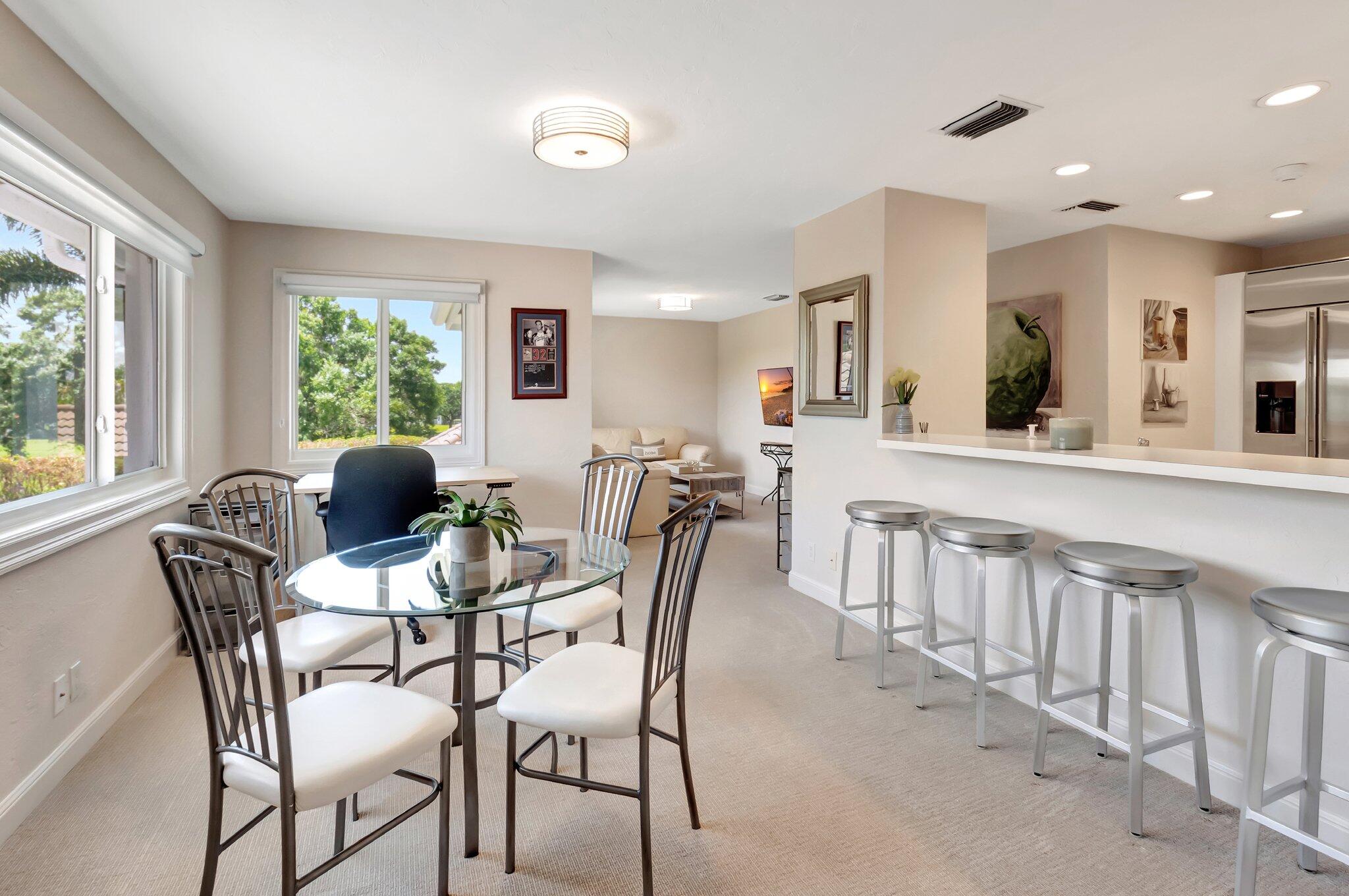 2599 Northwest 63rd Lane Boca Raton, FL 33496 - Photo 37 of 81 a view of a dining room with furniture window and outside view