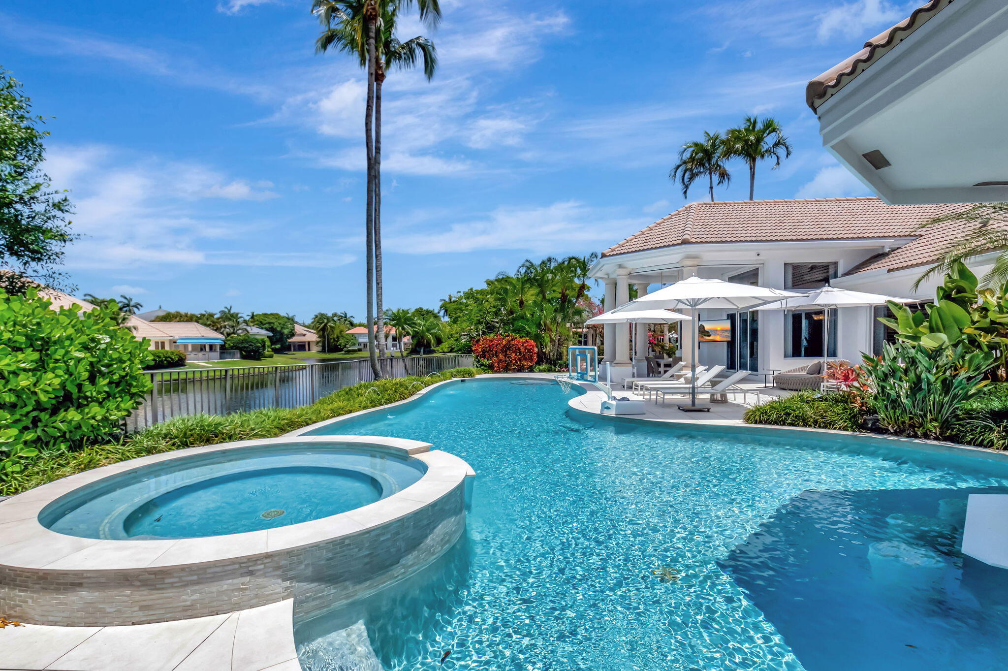 2599 Northwest 63rd Lane Boca Raton, FL 33496 - Photo 49 of 81 a view of an house with backyard space and sitting area
