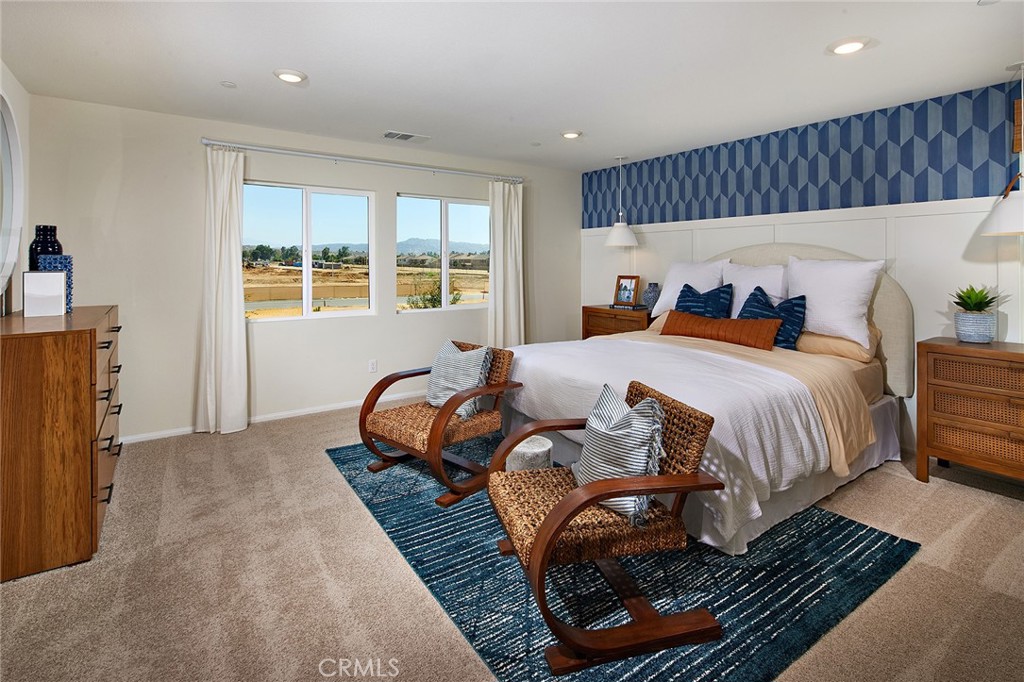 1340 Callista Way Perris, CA 92571 - Photo 3 of 3 a bedroom with bed and a window