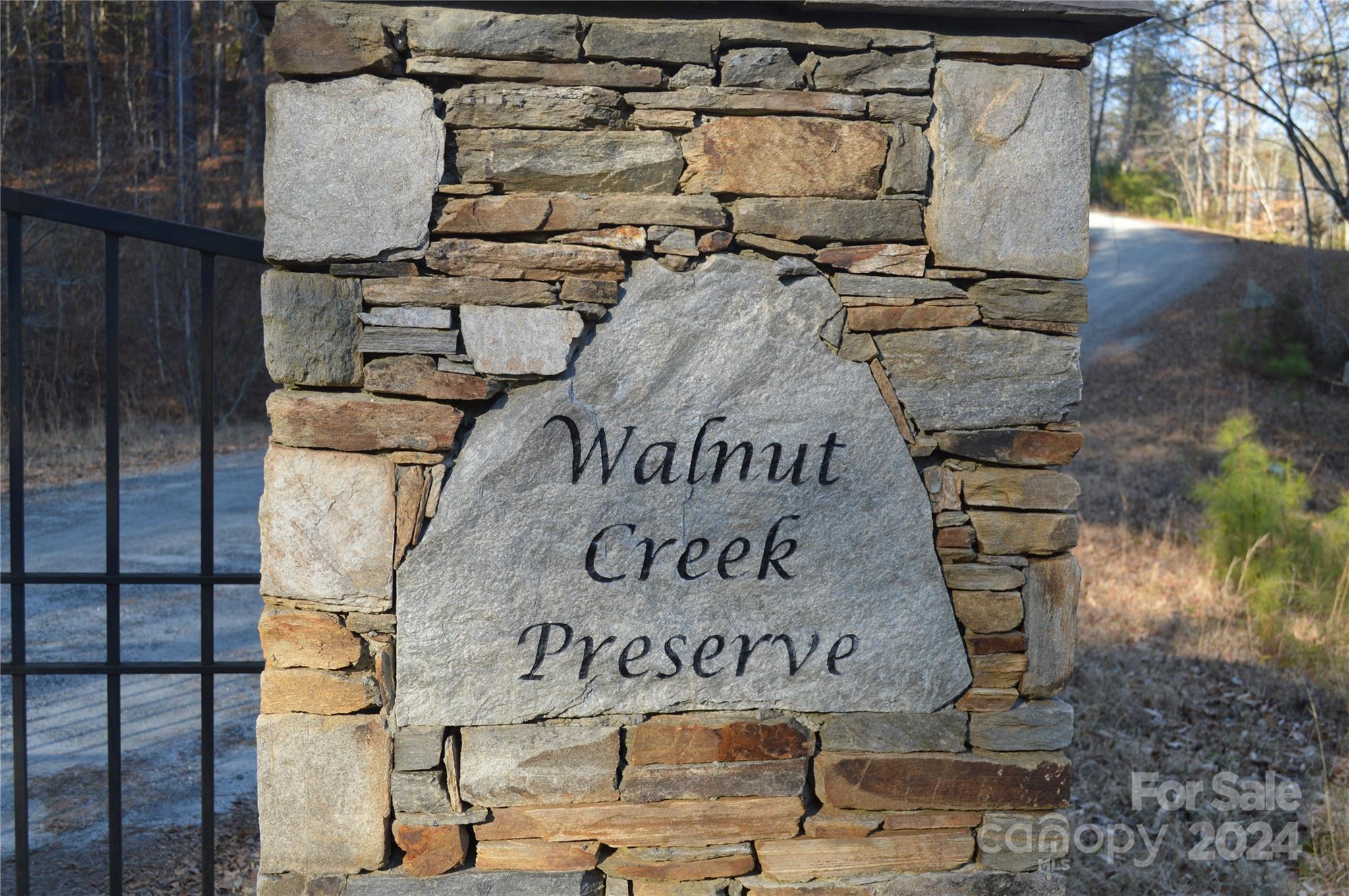 0 Maggie Pye Ln Mill Spring, Unit 7 Mill Spring, NC 28756 - Photo 7 of 8 a view of a sign board