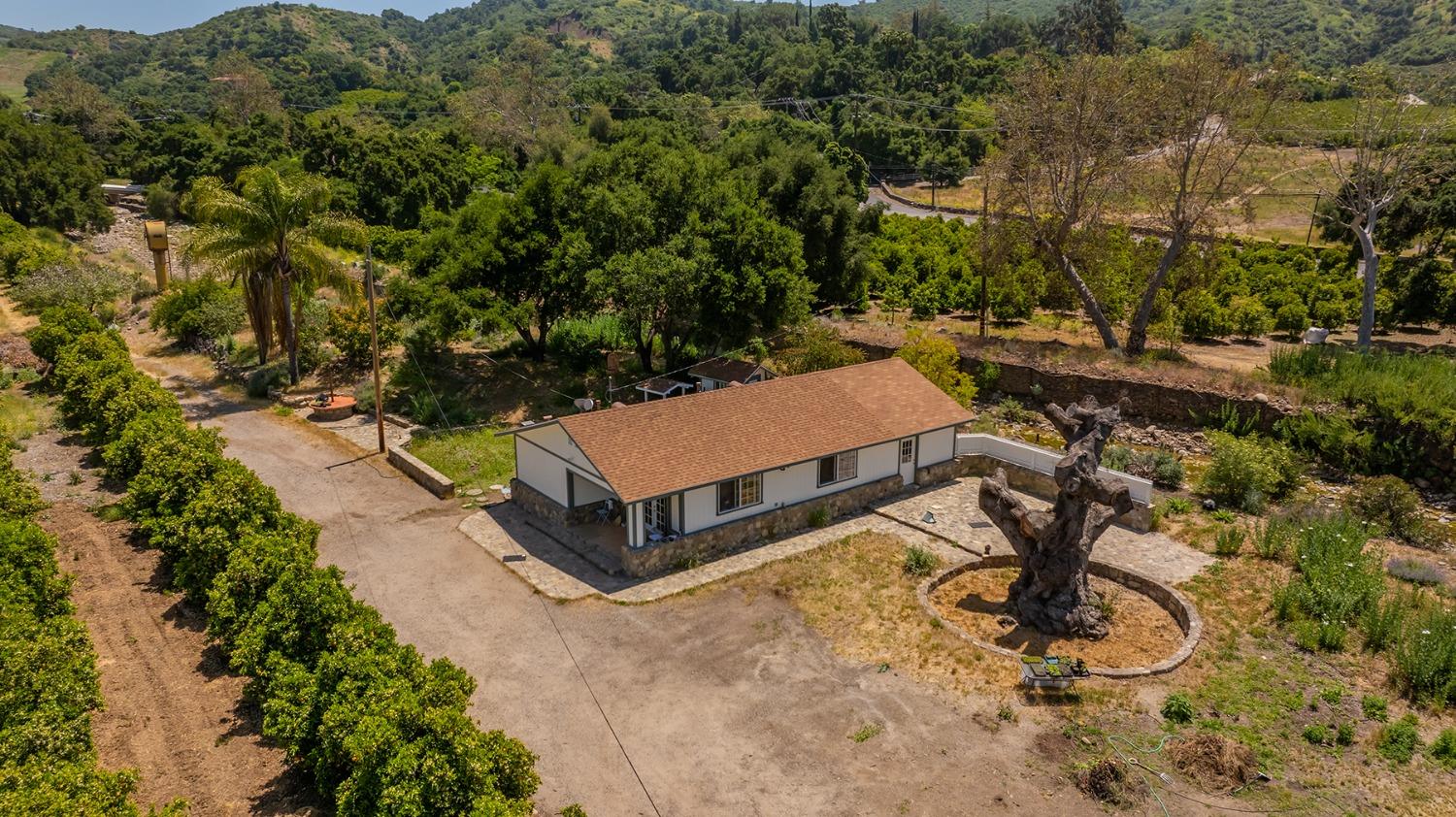 3359 Reeves Road Ojai, CA 93023 - Photo 17 of 42 an aerial view of a house with yard and mountain view in back