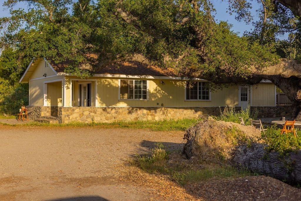 3359 Reeves Road Ojai, CA 93023 - Photo 23 of 42 a front view of a house with yard and lake view