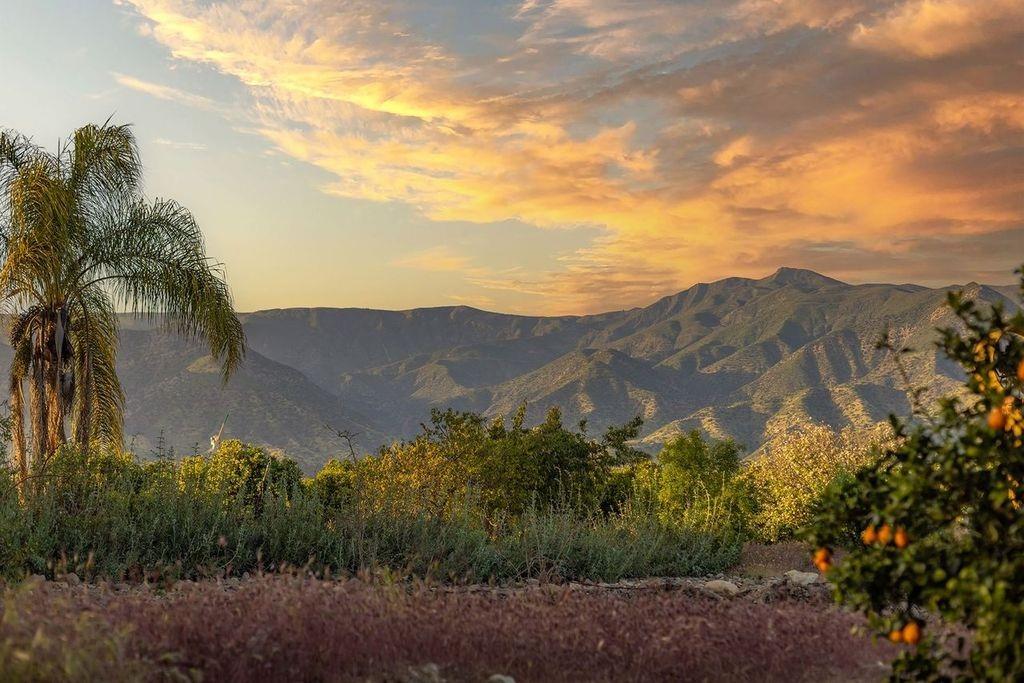 3359 Reeves Road Ojai, CA 93023 - Photo 42 of 42 a view of a house with a mountain in the background