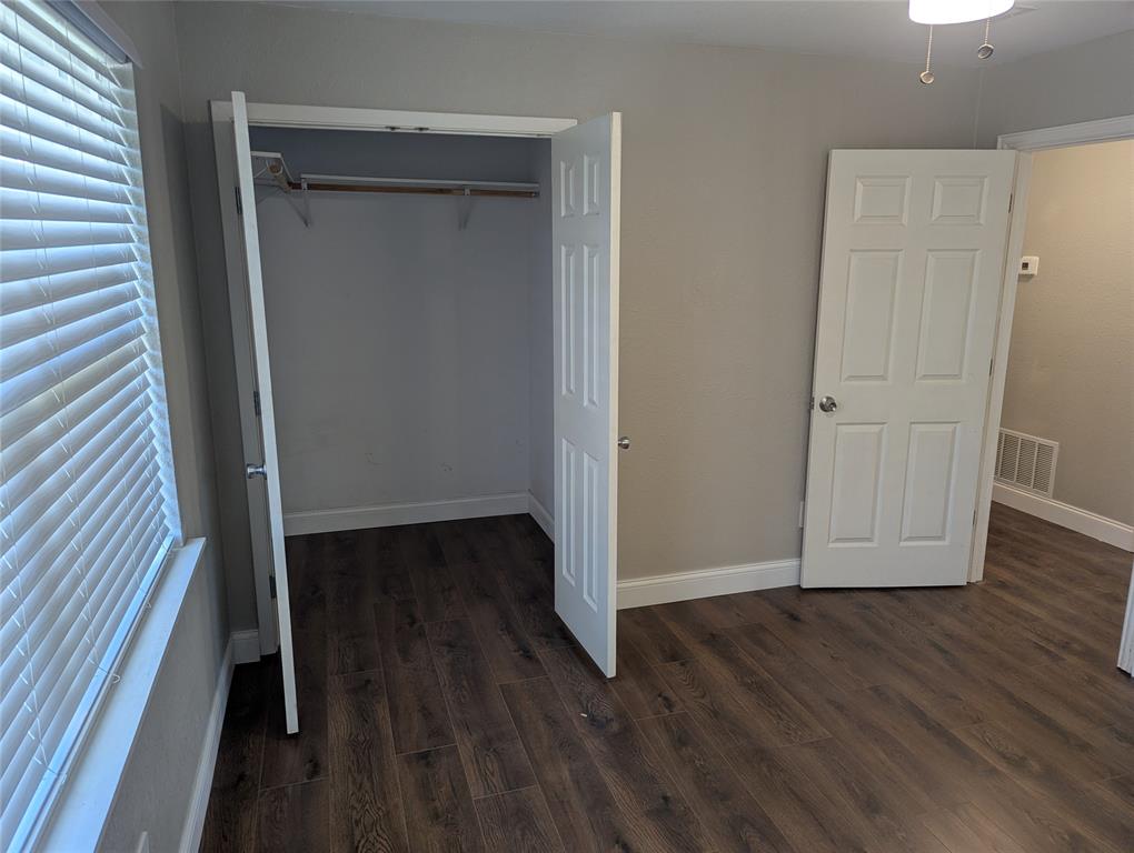 100 West Hull Street Denison, TX 75021 - Photo 14 of 28 a view of a room with wooden floor