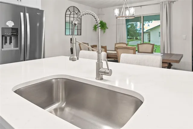 a view of a dining room with furniture