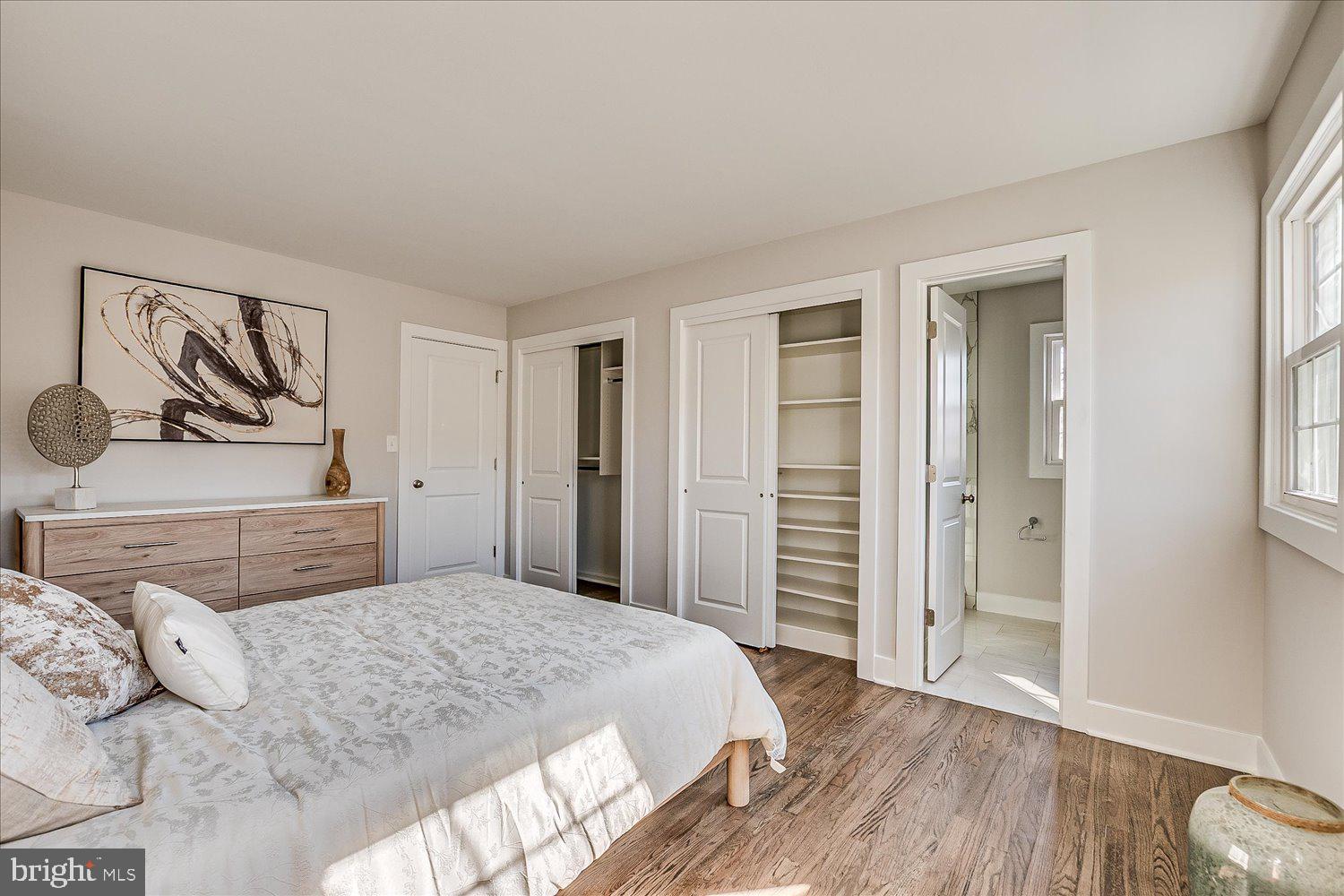 57 Mt Lucas Road Princeton, NJ 08540 - Photo 28 of 41 a bedroom with a large bed and wooden floor