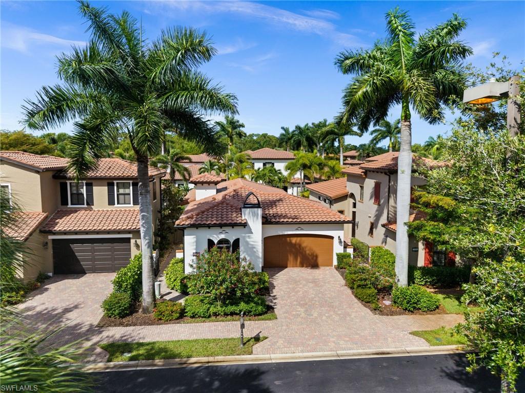 8000 Cordoba Place Naples, FL 34113 - Photo 2 of 40 Tile roof - Paver drive