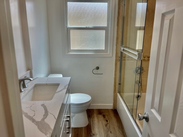 19550 Vanowen Street Reseda, CA 91335 - Photo 7 of 10 a bathroom with a sink and toilet