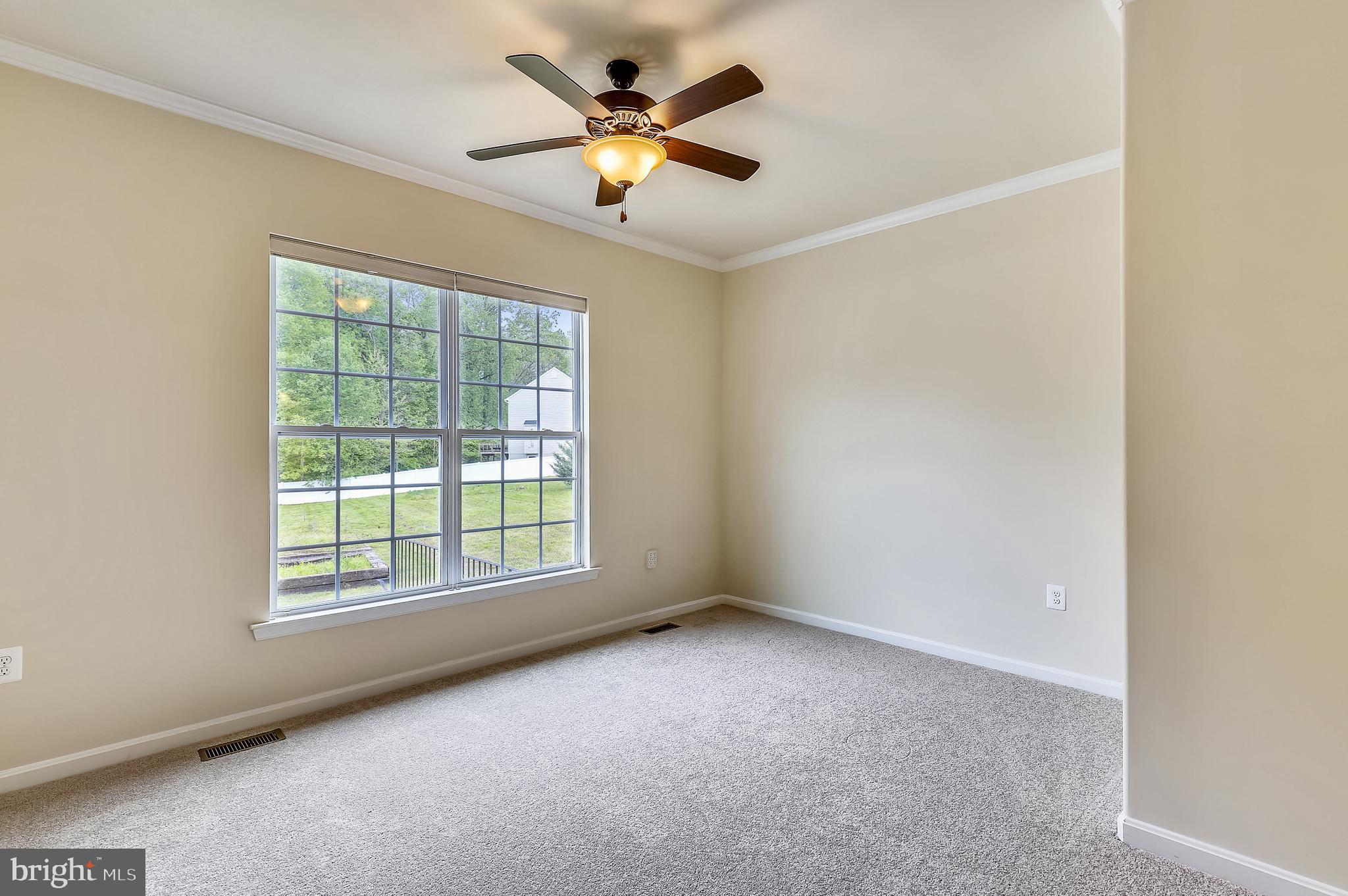 2051 Baythorne Road Prince Frederick, MD 20678 - Photo 21 of 61 Main level guest suite with ceiling fan