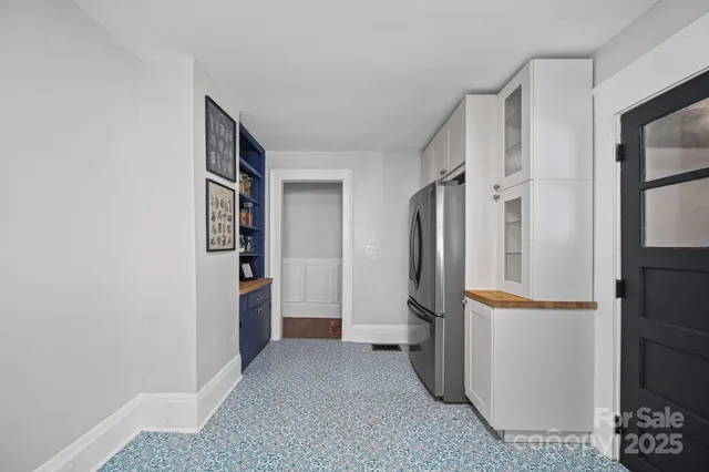 a view of walk in closet with cabinets