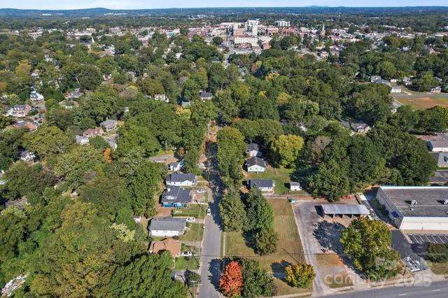 an aerial view of a city with lots of residential buildings