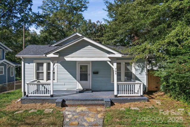 a front view of a house with a porch
