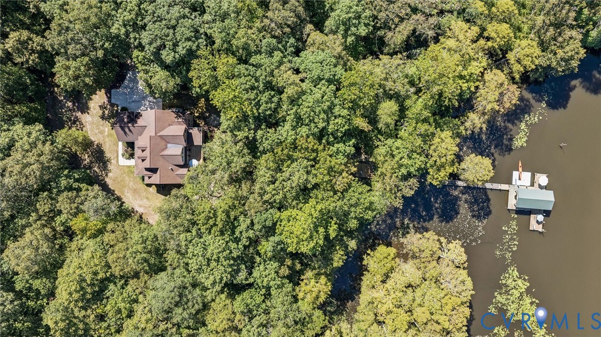 720 Arlington Island Road Lanexa, VA 23089 - Photo 1 of 50 Aerial view of property's location with a heavily