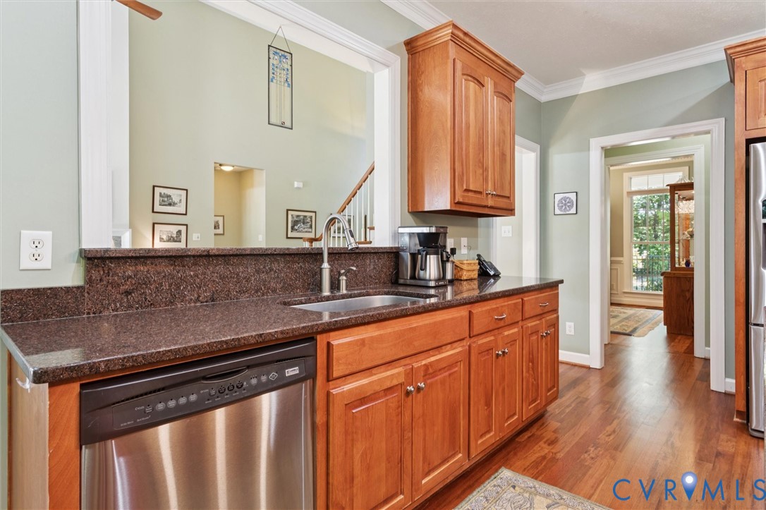 720 Arlington Island Road Lanexa, VA 23089 - Photo 25 of 50 Kitchen featuring dark stone countertops, stainles