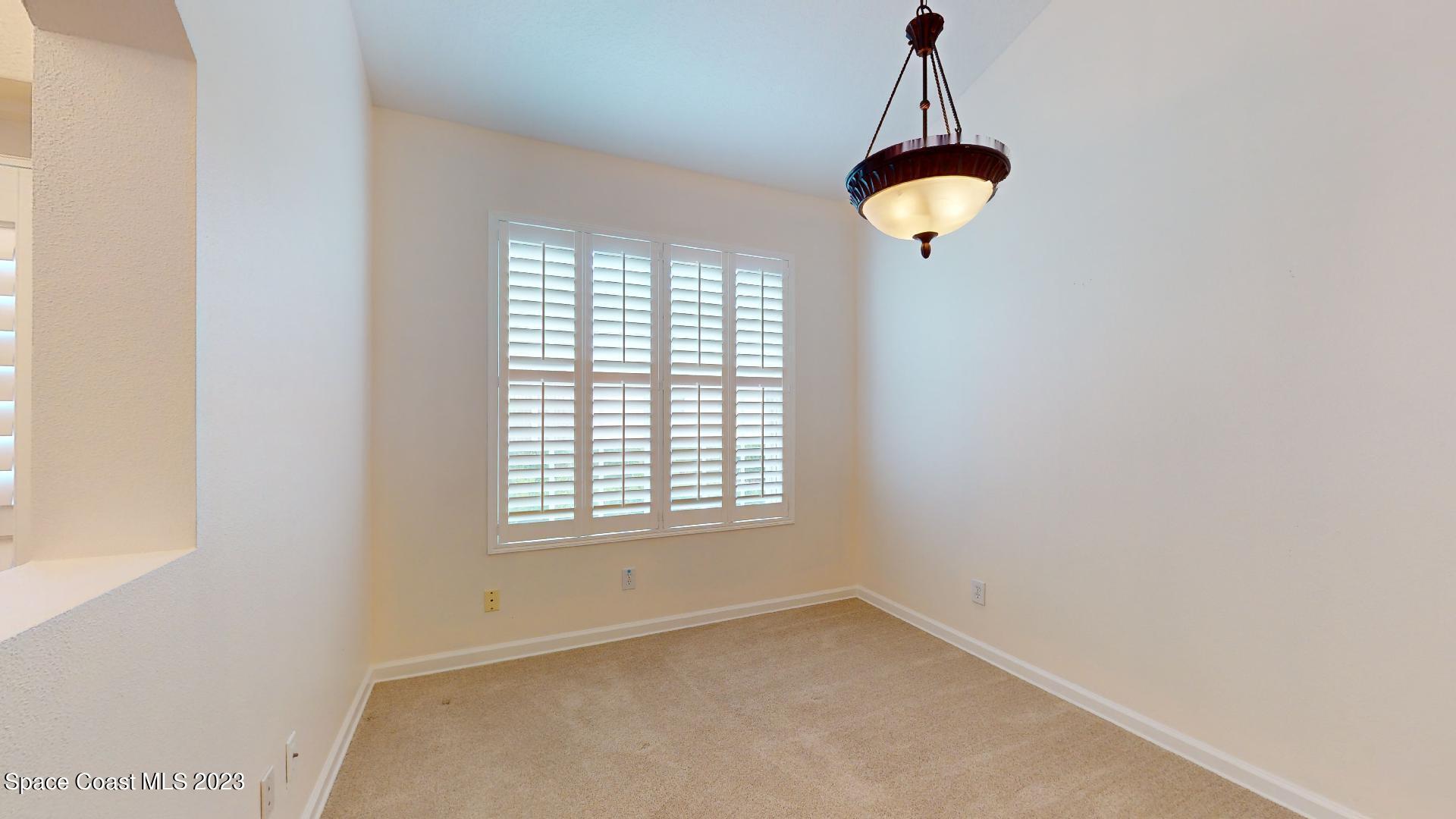 3151 Arden Circle Melbourne, FL 32934 - Photo 15 of 32 an empty room with a window